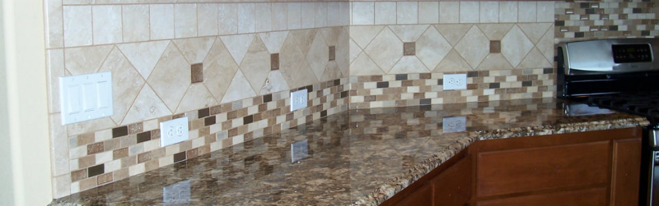 Kitchen remodel with ceramic tile backsplash and glass accents