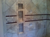 Ceramic Tile with Mosaic Glass Strip Accent including Soap and Shampoo Inset Shelf