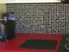 Modern Tile Backsplash with a Red Corian Countertop