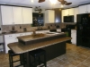 Kitchen Island with Ceramic Tile Floor and Matching Ceramic Tile Backsplash